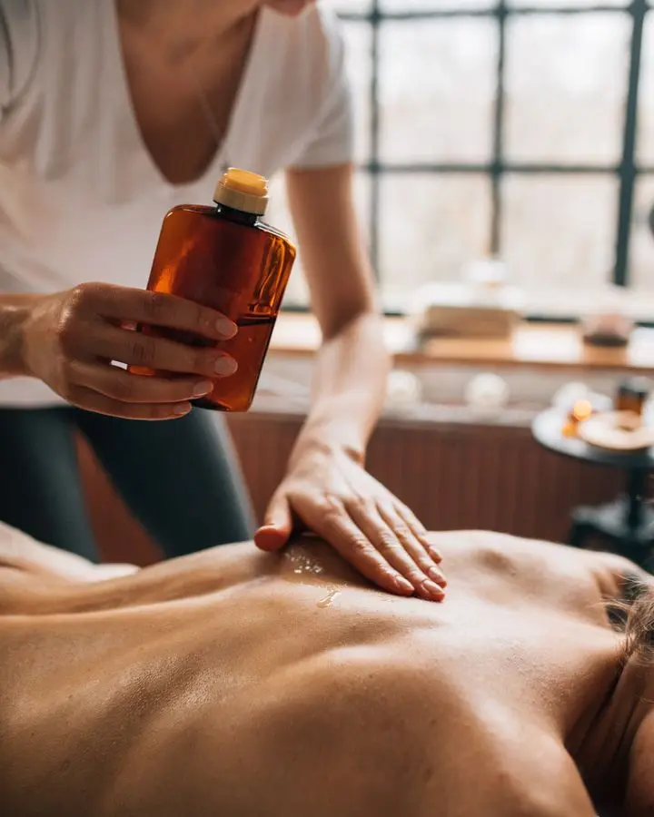 Professional spa massage using essential oils for ultimate relaxation and self-care.